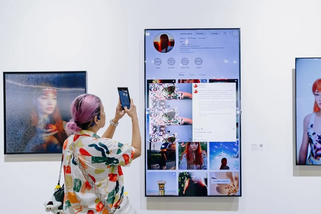 Visitor photographing Eva's Instagram diary installation at ART SG 2025.